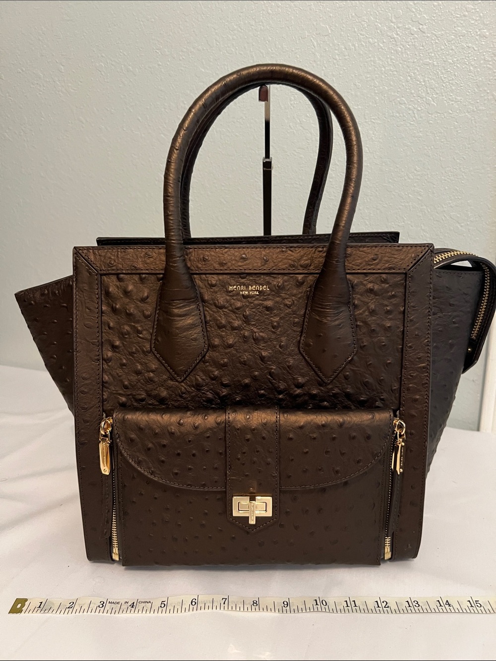 Henri Bendel Brinze Ostorich print cow hide leather purse with detachable clutch